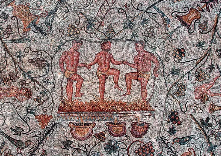 pisa de la uva en un mosaico romano